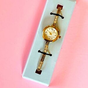 Avon Gold and White Women's Sparkle Tennis Bracelet Watch